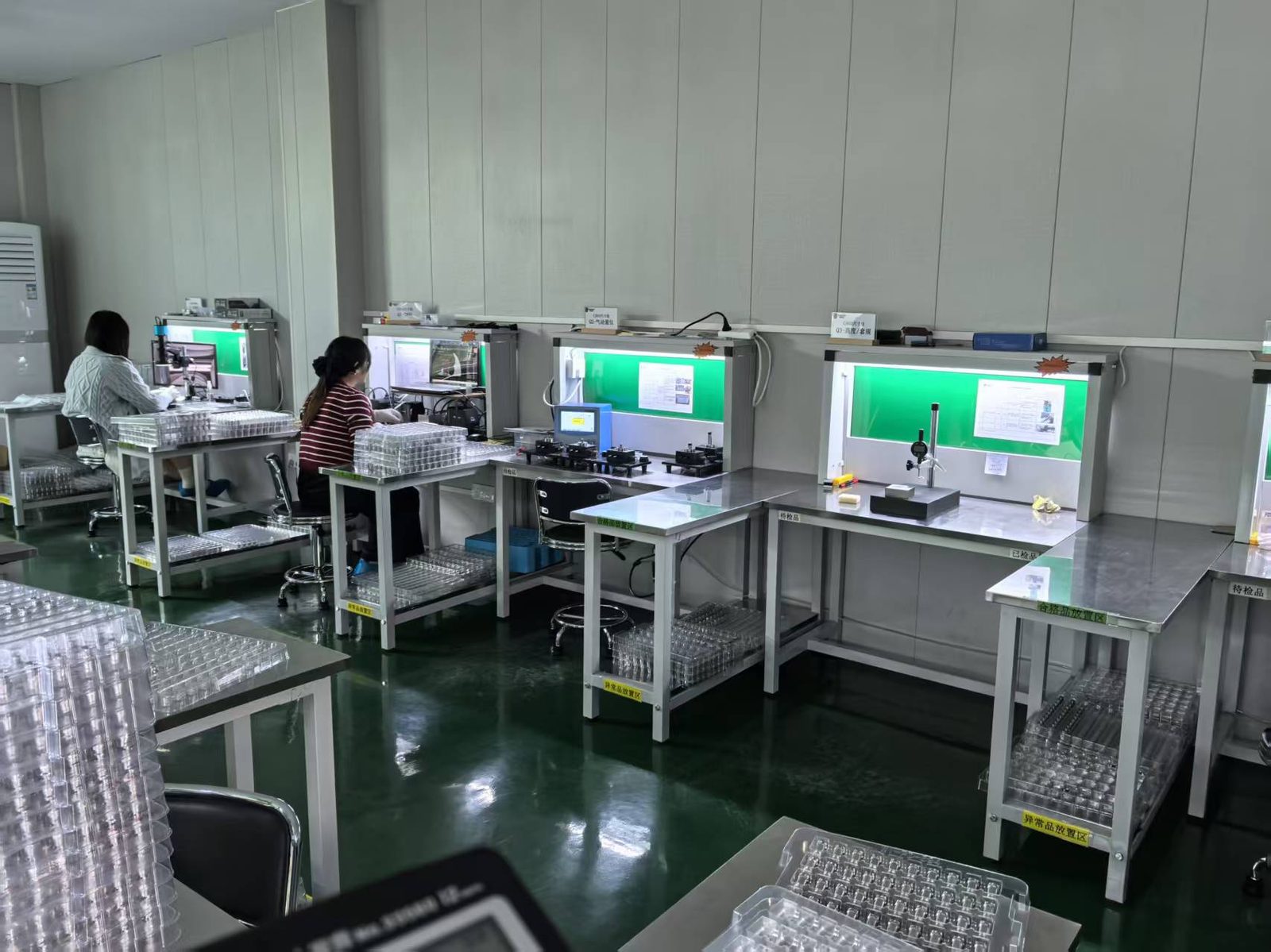 Full-inspection room with dedicated benches and lighting for final checking of turned parts